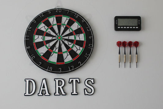 Dartboard with a 'Darts' sign on a white background